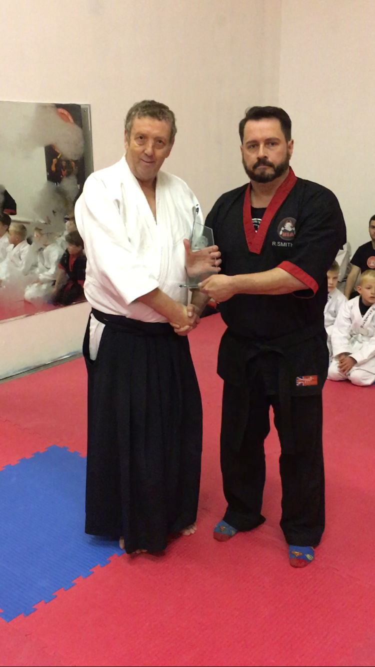 Sensei Yates receiving Appreciation Awward